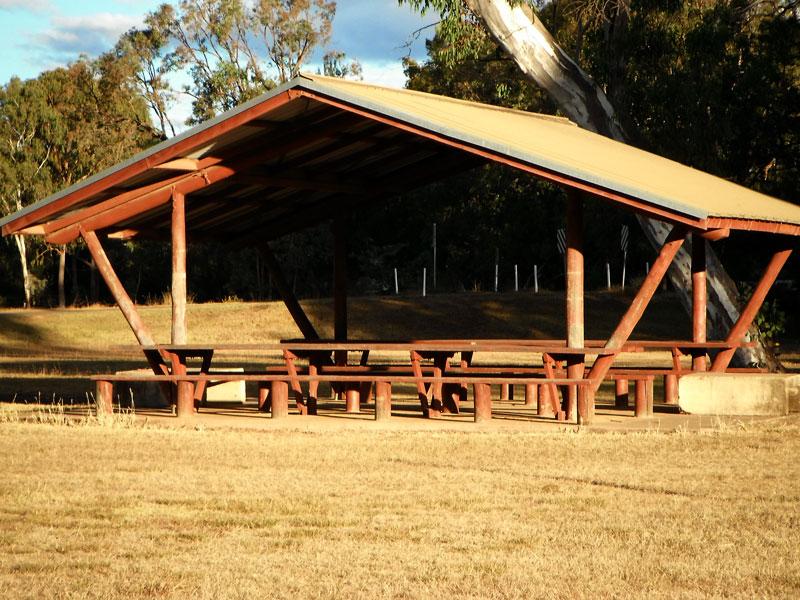 Sheltered picnic tables at Woolomin campgroundThe picnic area is within the campground and is really handy in bad weather.