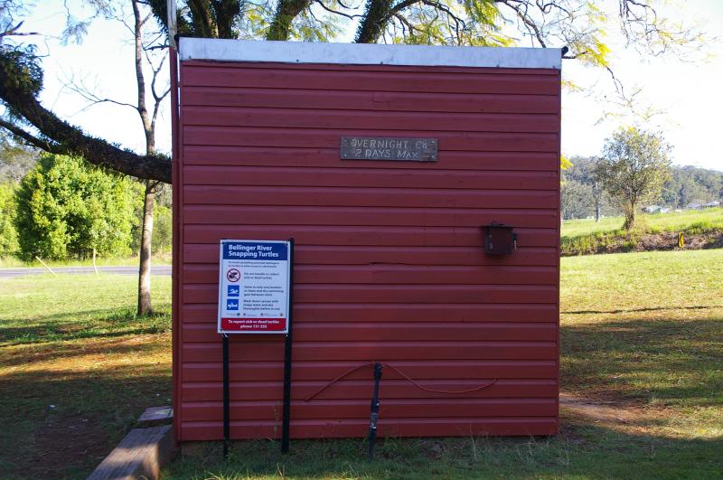 ThoraToilet block, snapping turtle sign, and donation box