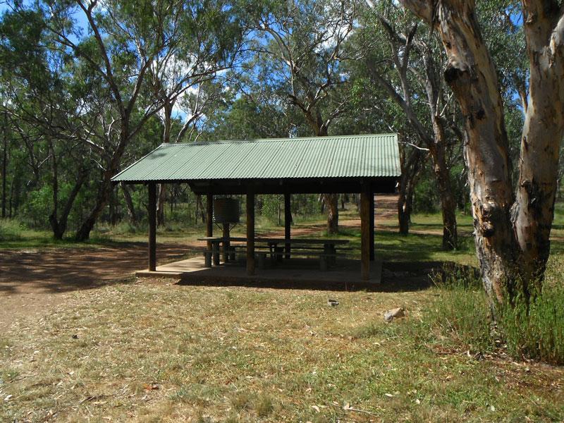 Picnic tables at Cockburn River campgroundThe undercover picnic table also has a small water tank, however it looks a bit old so may not hold water for long.