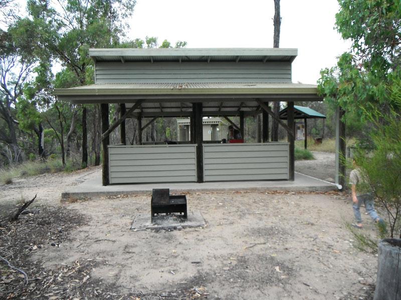 Covered picnic areaThe covered picnic area is quite large with three tables, and a small wood barbecue.